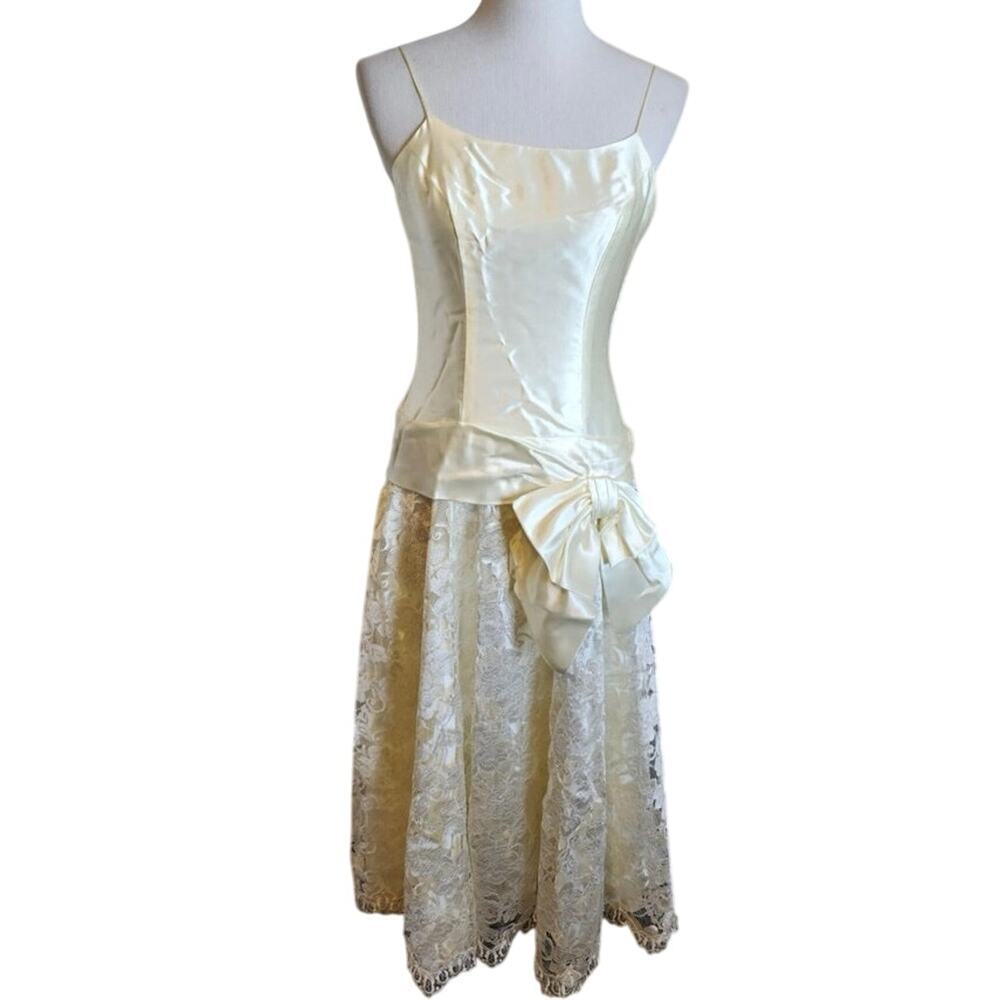 Elegant 1980s Princess Form Fitting Satin and Lace gown